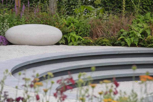 Detailed image of Jura Green limestone at show garden, capturing subtle colour shifts and natural stone patterns.***Rosebank Landscaping & Tom Simpson
