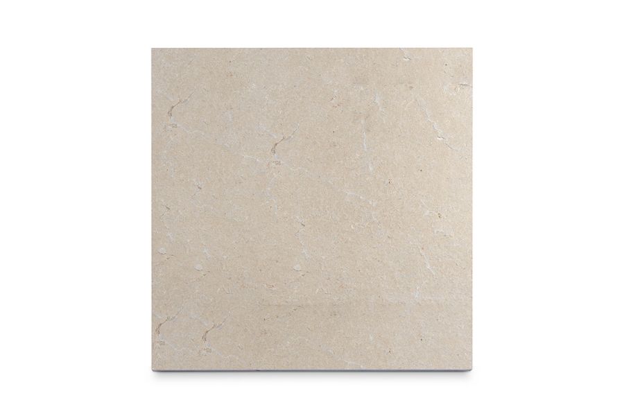 Single Capri Beige flamed limestone slab seen from above, showing the  the pavings surface texture and markings. Bespoke sizes available.