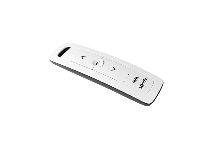 Somfy 5 IO Pure Handset on white background, with five channels for managing LED lighting, heaters, and shade blinds on Deluxe Pergolas.