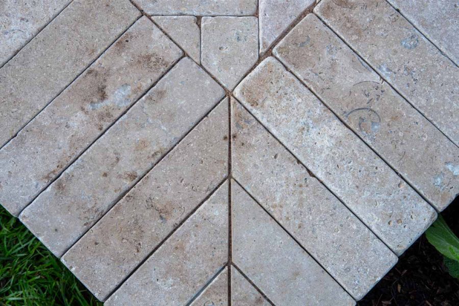 Close up shot of egyptian beige limestone pavers at RHS Tatton Park 2024, design by Nadine Mansfield.