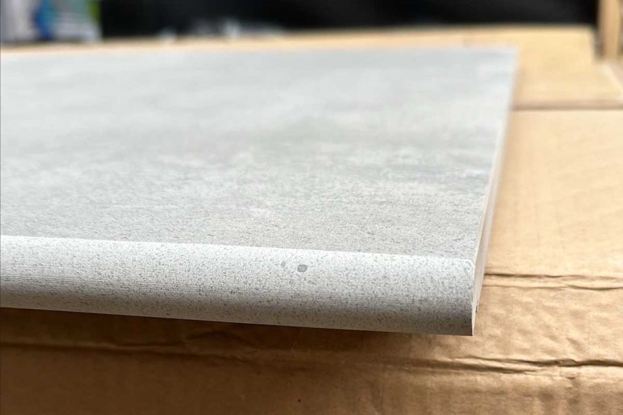 Side profile of one Venetian Grey 20mm moulded bullnose step. Available off the shelf and with free UK delivery.