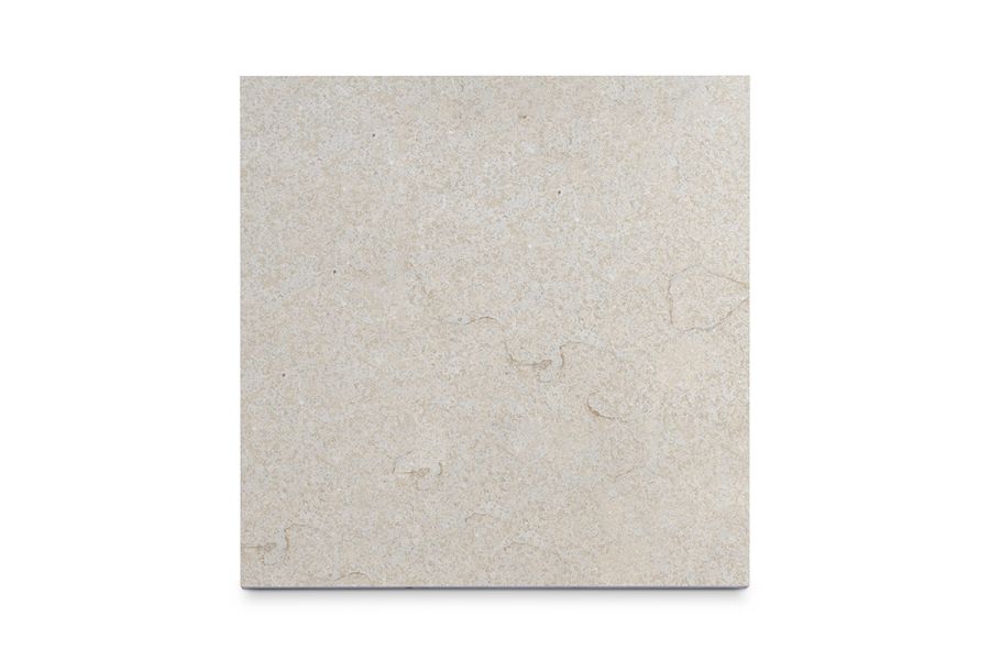 Single Vicenza Beige flamed limestone slab seen from above, showing the pavings surface texture and markings. Bespoke sizes available.