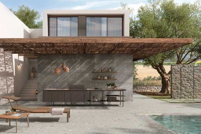 Modern building with canopy shading outdoor kitchen on Brera 800x800 Porcelain Paving next to swimming pool.***


