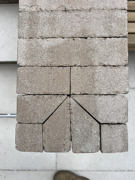 Top of steps' flank wall, showing cutting detail of Stone Grey clay pavers