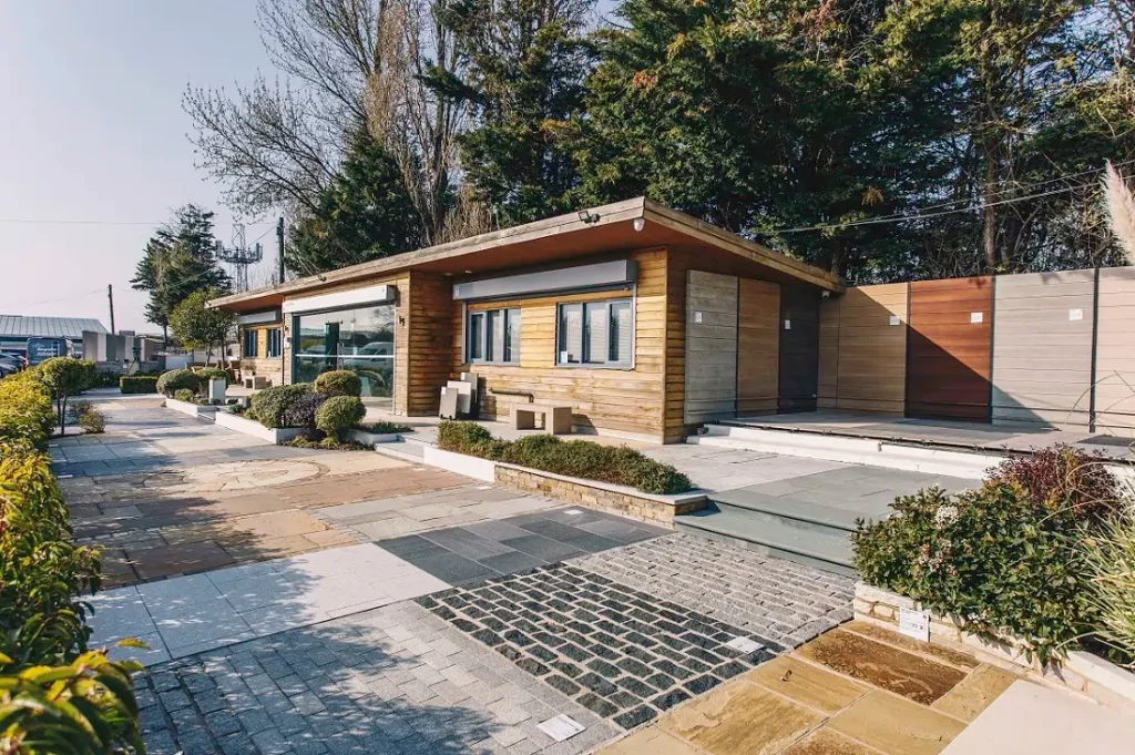 Paving showroom with display area from pavers and clay blocks in front.